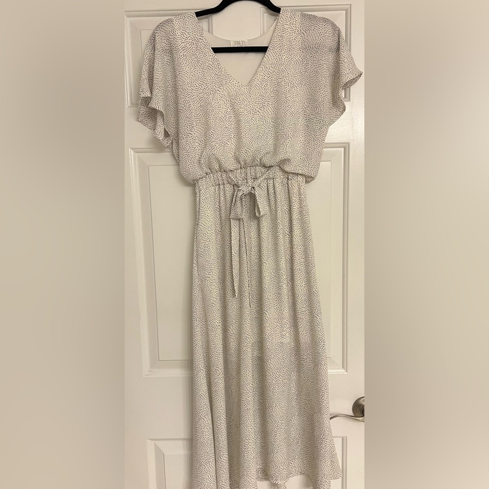 White dress with black dot pattern